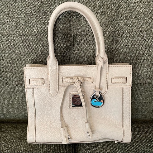 Dooney & Bourke Handbags - Dooney and Bourke East West Ivory Pebbled Leather Tasseled Mini Bag Purse